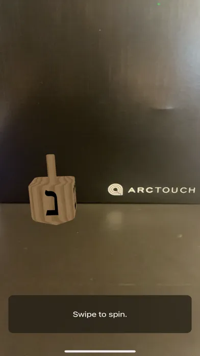 ภาพหน้าจอของ iGevalt - Dreidel Simulator