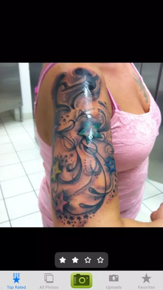 Tangkapan skrin Top Tattoos